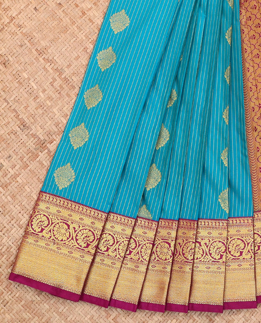 Blue Budget Silk Saree, Embellished with Zari Buttas and Stripes All Over Its Body, Complemented by a Contrast Traditional Zari Design Border, Grand Pallu, and Paired with a Contrast Blouse