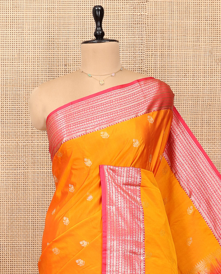Orange Budget Silk Saree, Graced with Zari Buttas, Complemented by a Contrast Traditional Zari Border, Pallu of Jaal and Paisleys, and Contrast Blouse