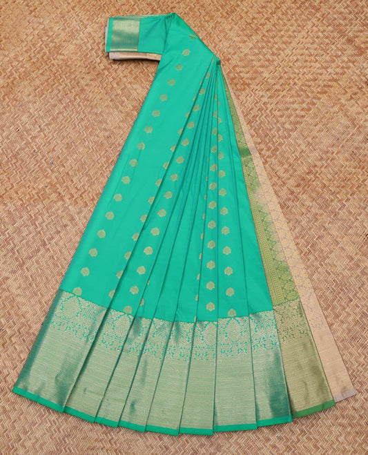 Green Budget Silk Saree, Mesmerized with Zari Buttas All Over Its Body, Complemented by Contrast Traditional Zari Designs Woven Border, Grand Pallu and Paired with a Contrast Blouse