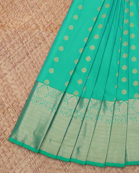 Green Budget Silk Saree, Mesmerized with Zari Buttas All Over Its Body, Complemented by Contrast Traditional Zari Designs Woven Border, Grand Pallu and Paired with a Contrast Blouse