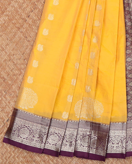 Yellow Budget Silk Saree, Elevated with Zari Buttas All Over Its Body, Complemented by a Contrast Traditional Zari Design Border, Pallu Depicts Jaal Designs, and Paired with a Contrast Blouse