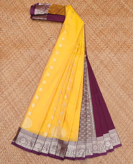 Yellow Budget Silk Saree, Elevated with Zari Buttas All Over Its Body, Complemented by a Contrast Traditional Zari Design Border, Pallu Depicts Jaal Designs, and Paired with a Contrast Blouse