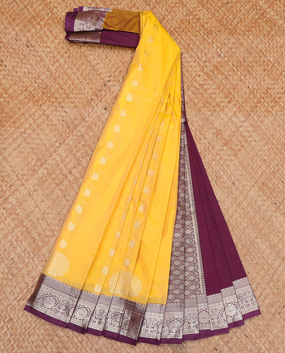 Yellow Budget Silk Saree, Elevated with Zari Buttas All Over Its Body, Complemented by a Contrast Traditional Zari Design Border, Pallu Depicts Jaal Designs, and Paired with a Contrast Blouse
