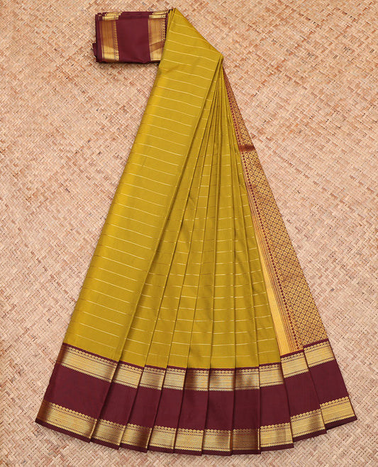 Green Budget Silk Saree, Gleamed Up with Zari Stripes All Over Its Body, Complemented by a Contrast Traditional Zari Design-Woven Rettai Pettu Border, Grand Jaal-Patterned Pallu, and Paired with a Contrast Blouse