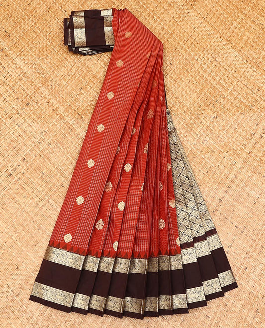 Red buttas and checked gift saree, contrast temple rettai pettu border of traditional zari designs, and zari-rich pallu