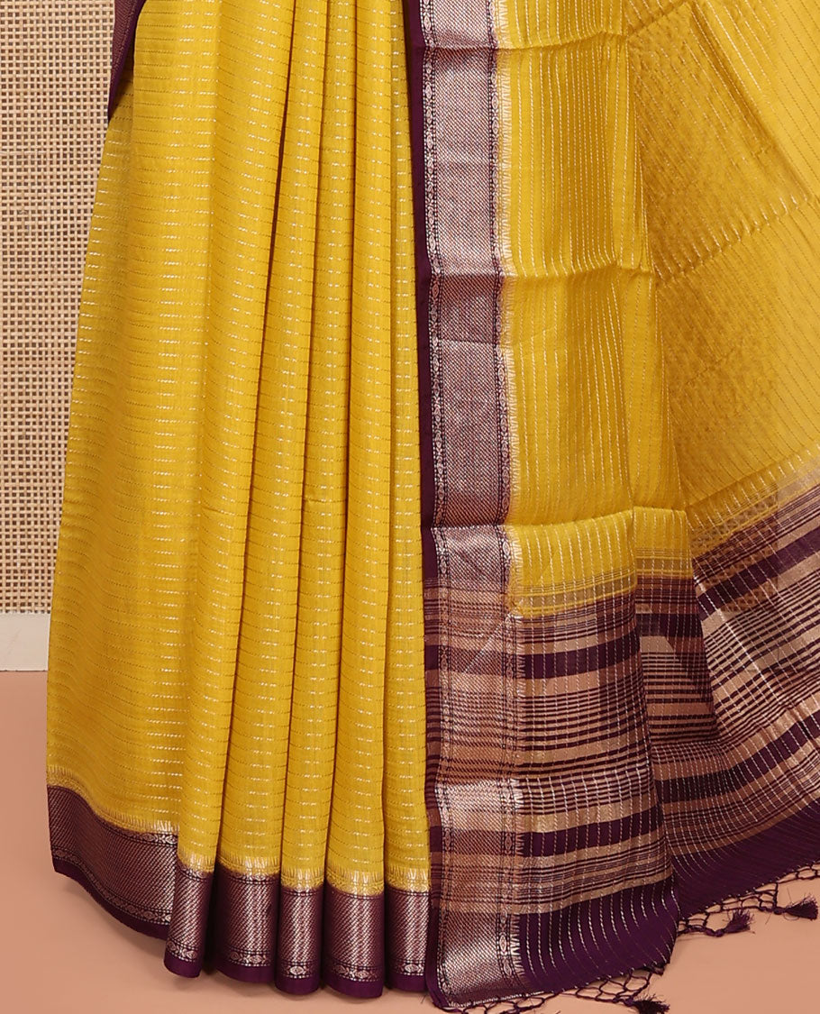 Yellow Assam Silk Saree, Sparsely Sparkled with Zari Stripes, Complemented by Contrast Zari Border of Traditional Designs, Pallu Features Zari Stripes, and Paired with a Contrast Blouse