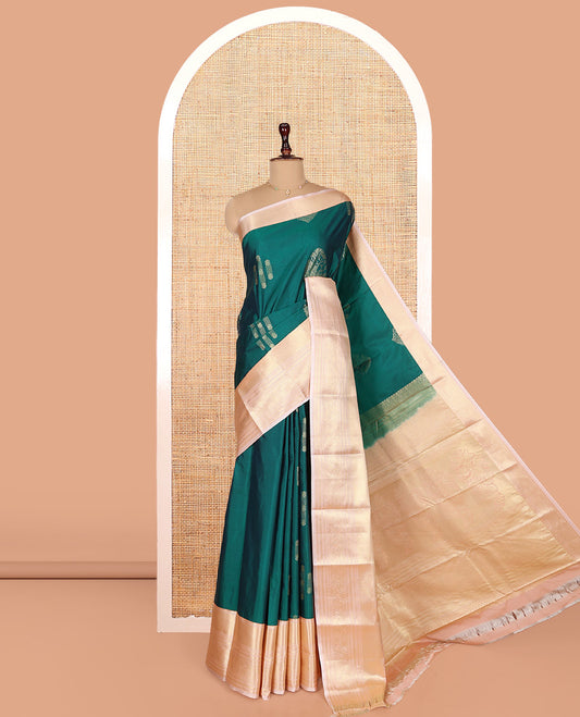 Green Budget Silk Saree, Beautifully Bedecked with Zari Buttas on Its Body, Complemented by a Contrast Traditional Zari Design Border, Grandly Decorated Pallu, and Paired with a Contrast Blouse