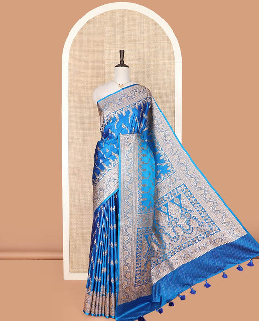 Blue floral buttas banarasi silk saree, traditional zari border of floral creeper designs, and pallu of intricate designs