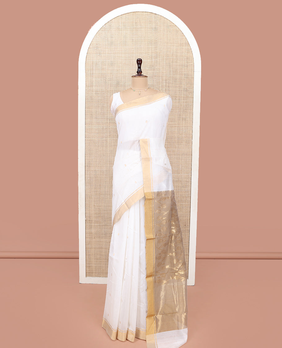 Cream Chanderi Cotton Saree, Graced with Buttas All Over Its Body, Highlighted by a Bavanji Border, Captivating Contrast Pallu of Floral Jaal Designs, and Paired with a Contrast Blouse
