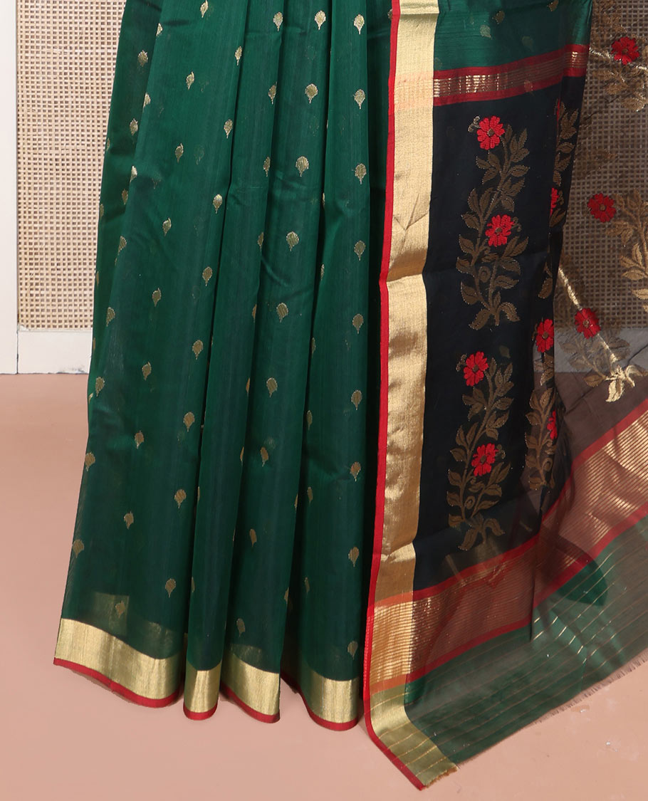 Green Chanderi Cotton Saree, Spotlighted with Zari Buttas All Over Its Body, Highlighted by Zari Border, Pallu of Floral Buttas, and Paired with a Contrast Blouse