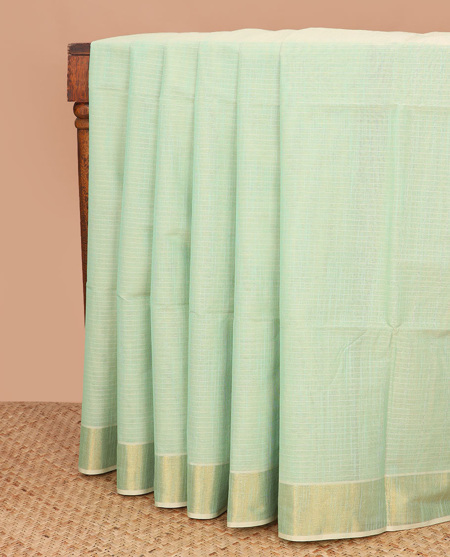 Green sparsely striped jute cotton saree, zari border, and striped pallu
