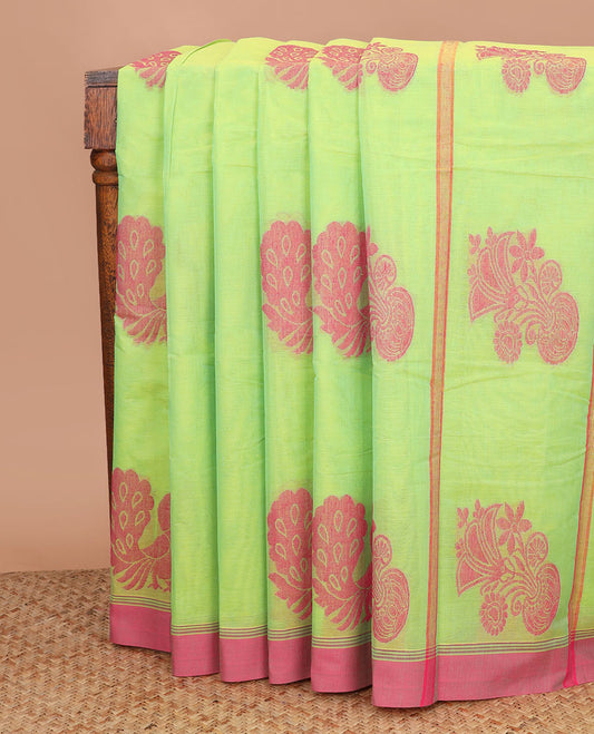 Neon green peacock buttas kanchi cotton saree, contrast plain border, and floral potted pallu