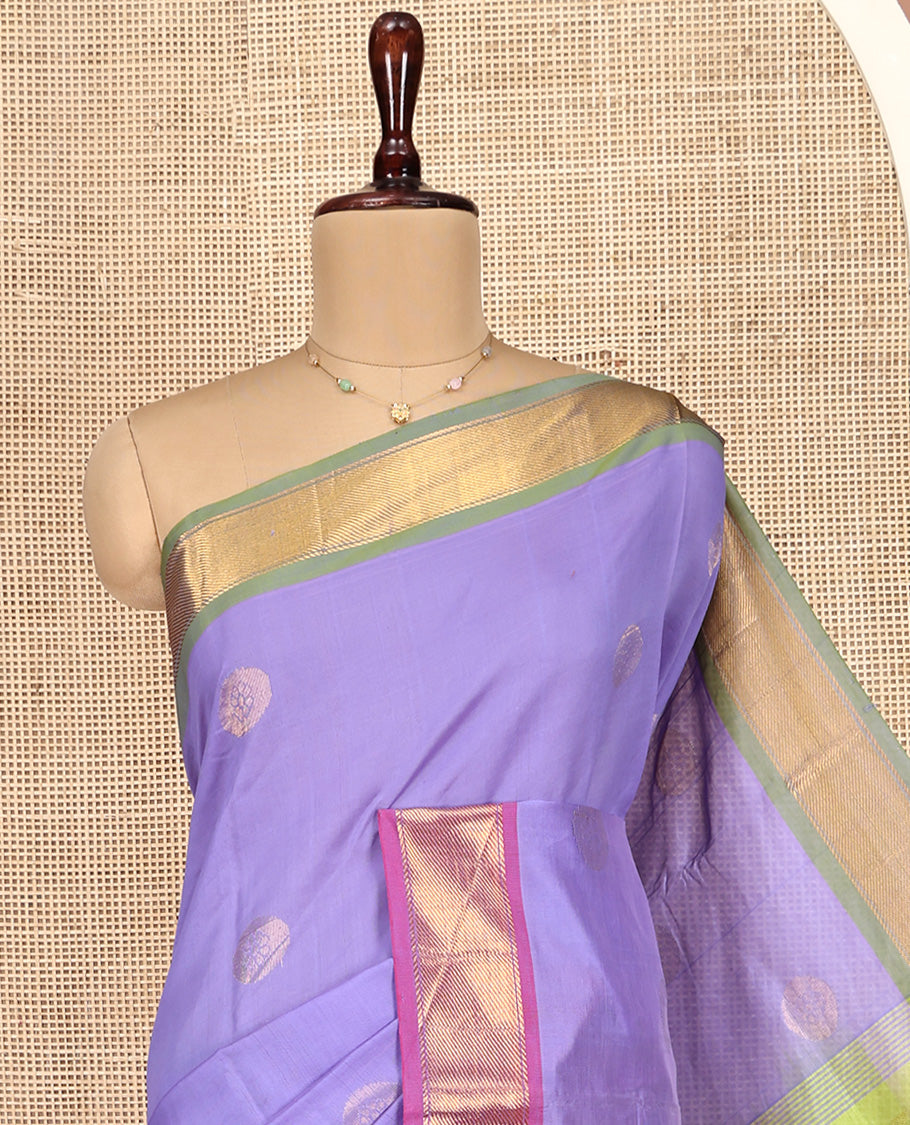Lavender Poly Cotton Saree, Enthralled with Zari Buttas on Its Body, Complemented by Contrast Ganga-Jamuna Border, Chevron Striped Pallu, and Paired with a Contrast Blouse