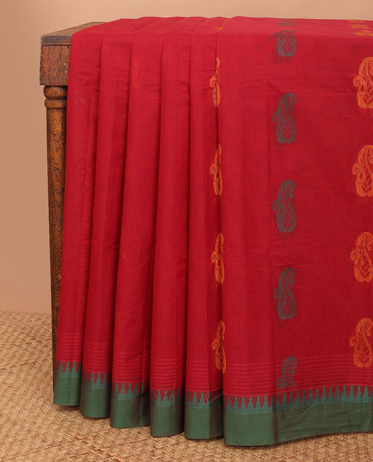 Red paisley motifs kanchi cotton saree, contrast temple border & pallu of floral designs