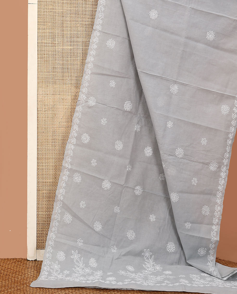 Grey floral thread embroidered buttas Lucknowi chikankari saree, floral creeper thread embroidered border, and floral embroidered pallu