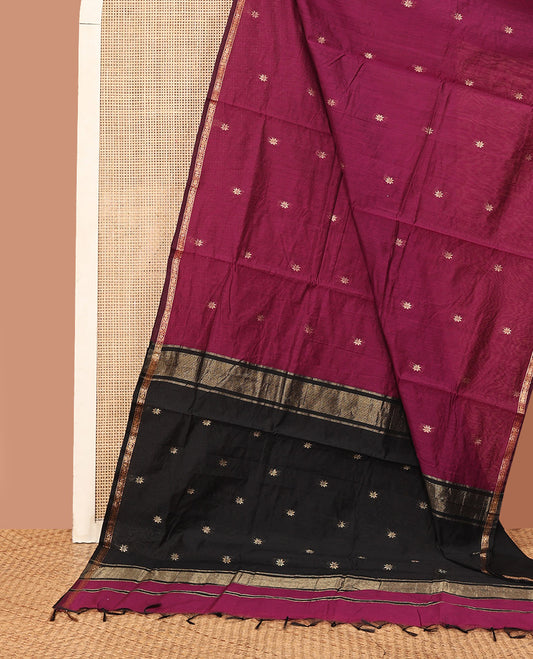 Wine Maheshwari Cotton Saree, Enthralled with Flower Buttas All Over Its Body, Subtly Woven Piping Border, Captivating Contrast Pallu Steeped with Buttas, and Paired with a Contrast Blouse
