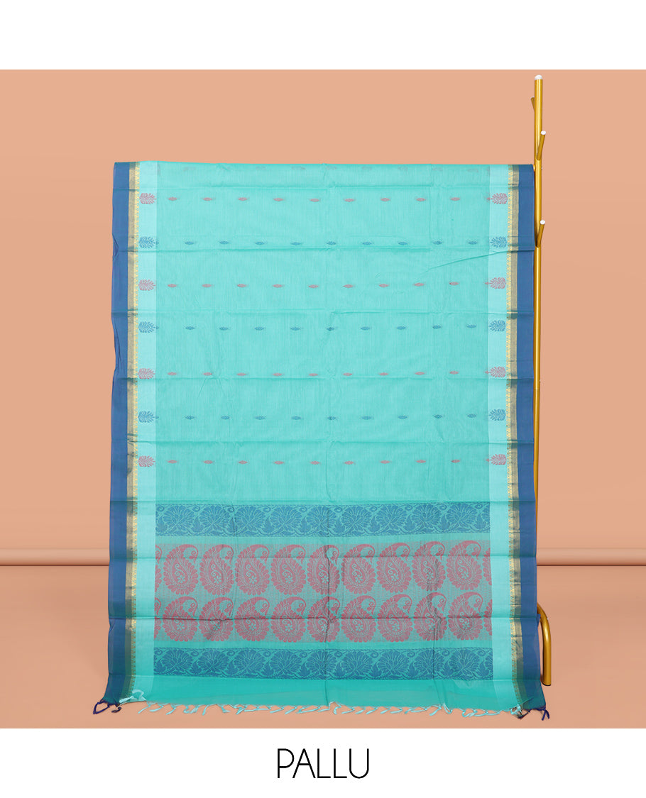 Blue Kanchi Cotton Saree, Decorated with Buttas All Over Its Body, Complemented by a Contrast Border, Pallu of Paisley Design, and Paired with a Matching Blouse