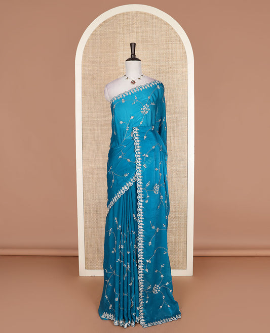 Blue stone and kardana floral vine embroidered designer saree, scallop stone work border