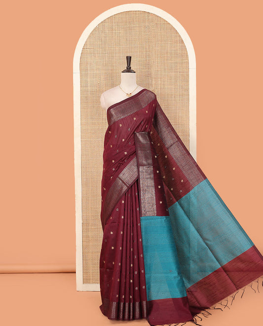 Maroon paisley buttas dupion saree, traditional zari border, and contrast striped pallu