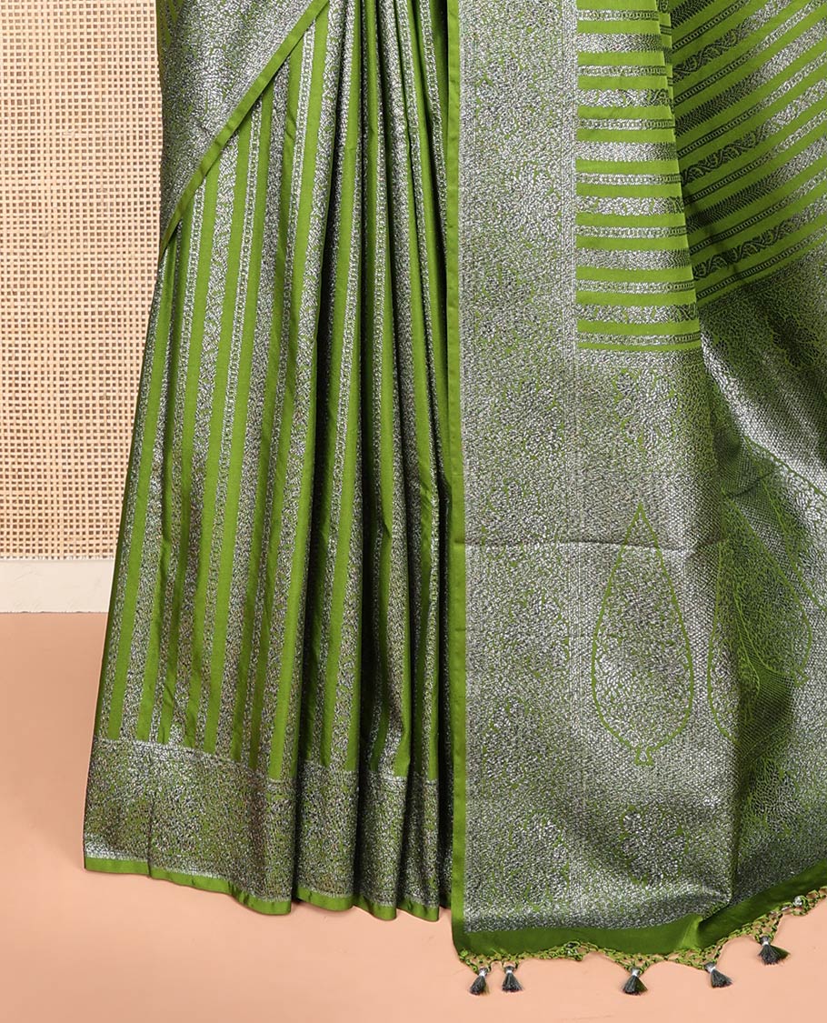 Green Fancy Georgette Saree Adorned with Vertically Zari Stripes, Hazily Zari Woven Border, Hazily Woven Pallu of Intricate Designs, and Paired with a Matching Blouse