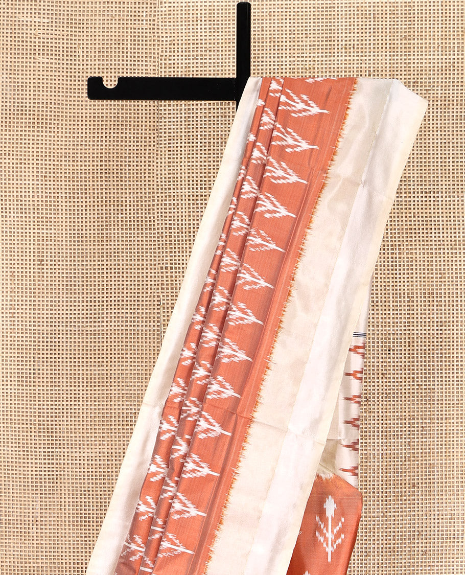 Peach Pochampally Ikat Silk Saree, Subtly Sparkled with Floral Ikkat Buttas on Its Body, Complemented by a Contrast Border, Pallu of Jaal-Pattern in Ikkat Weave, and Paired with a Contrast Blouse