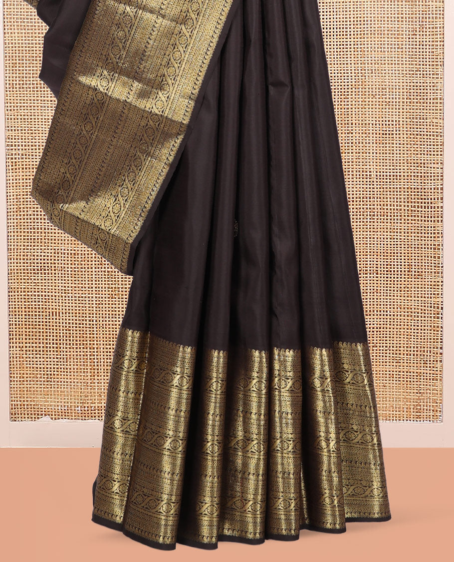 Brown Kanchipuram Silk Saree, Elevated with Zari Buttas, Highlighted by Zari Border of Manga, Paisa, Diamond, Neli, Cross Kamalam, Kathir, and Cross Neli, Jaal Pallu, and a Matching Blouse