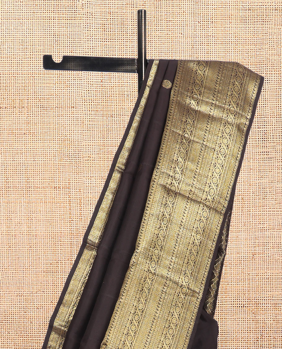 Brown Kanchipuram Silk Saree, Elevated with Zari Buttas, Highlighted by Zari Border of Manga, Paisa, Diamond, Neli, Cross Kamalam, Kathir, and Cross Neli, Jaal Pallu, and a Matching Blouse