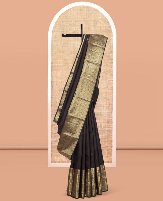 Brown Kanchipuram Silk Saree, Elevated with Zari Buttas, Highlighted by Zari Border of Manga, Paisa, Diamond, Neli, Cross Kamalam, Kathir, and Cross Neli, Jaal Pallu, and a Matching Blouse