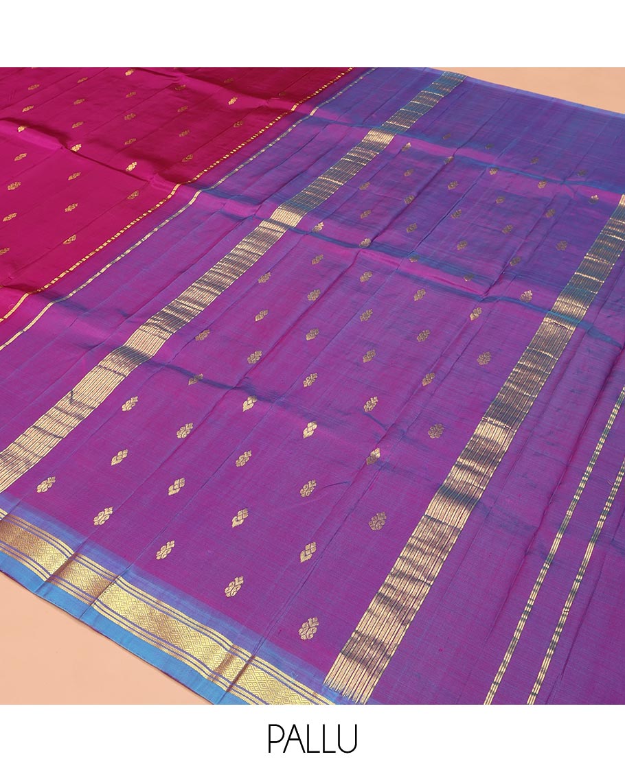 Magenta Kanchipuram Silk Saree, Adorned with Zari Buttas on Its Body, Complemented by a Contrast One-Sided Border of Banaras and Jaal Designs, Pallu Features Zari Designs, and Comes Without a Blouse