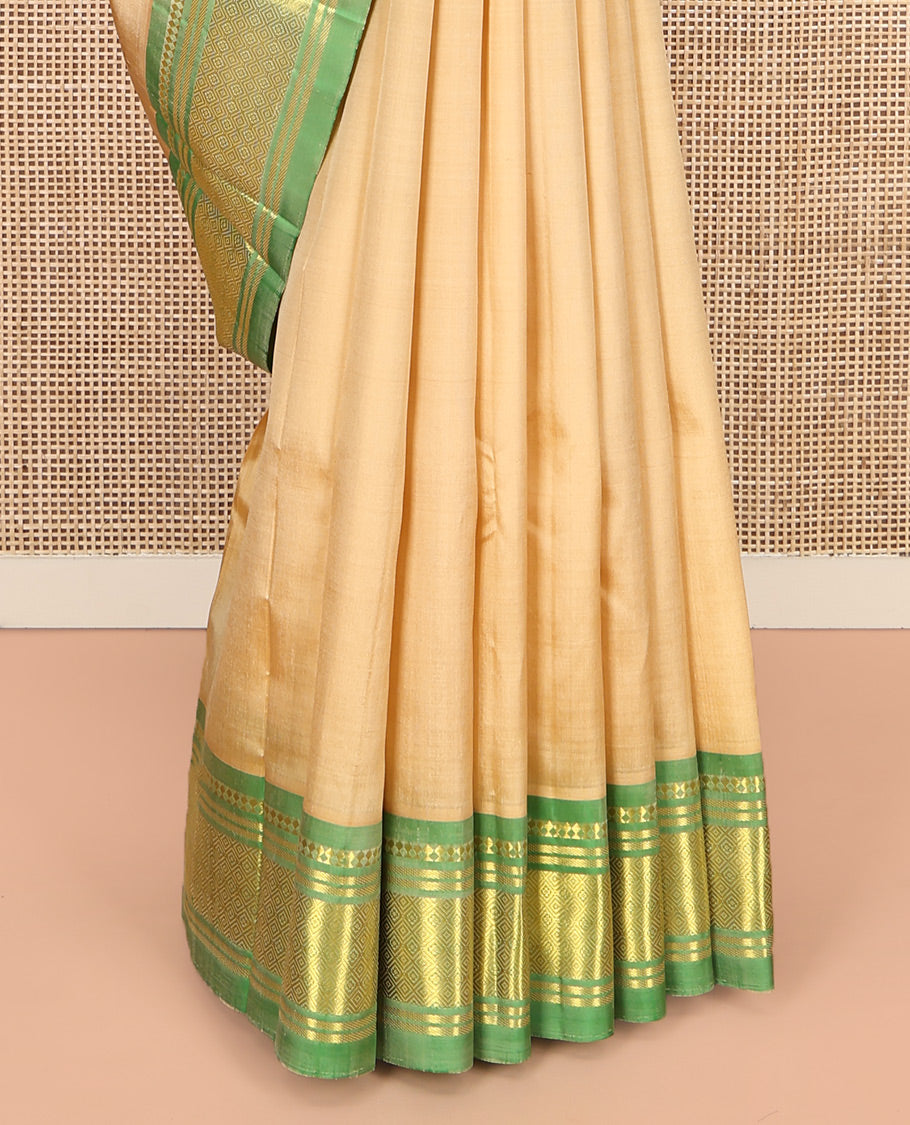Sandal Kanchipuram Silk Saree, Sparsely Sparkled with Zari Buttas, Complemented by a Contrast One-Sided Border of Panner Sombu, Banaras, and Jaal, Floral Design Pallu, and No Blouse