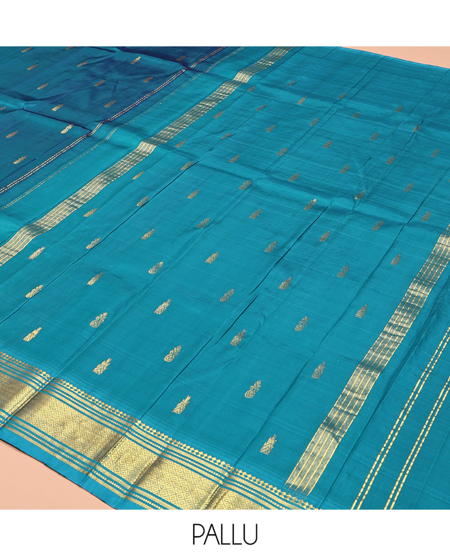 Blue Kanchipuram Silk Saree, Adorned with Zari Buttas, Complemented by a Contrast One-Sided Border of Panner Sombu, Banaras, Muthu, and Mayil Kann Designs, Grand Pallu, and No Blouse