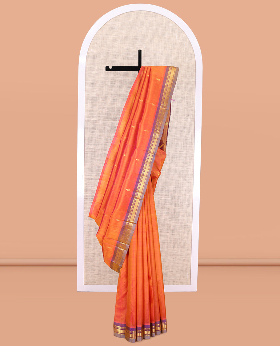Rust Kanchipuram Silk Saree, Adorned with Zari Buttas, a Contrast One-sided Border of Panner Sombu, Banaras, and Jaal Designs, Zari Woven Pallu, and No Blouse