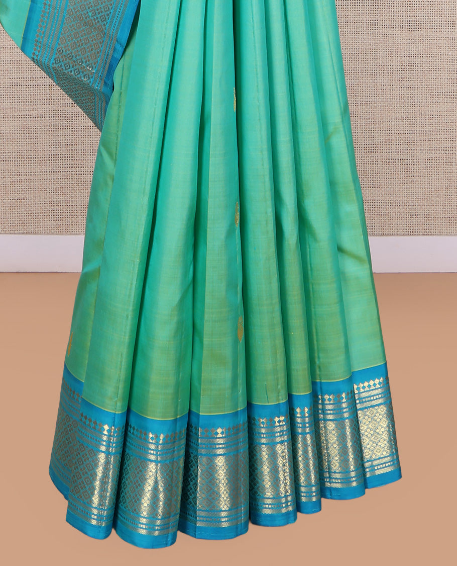 Turquoise Kanchipuram Silk Saree, Woven with Zari Buttas, a Contrast One-Sided Border of Panner Sombu, Banaras, Muthu, and Jaal Designs, Zari Design Pallu, and No Blouse