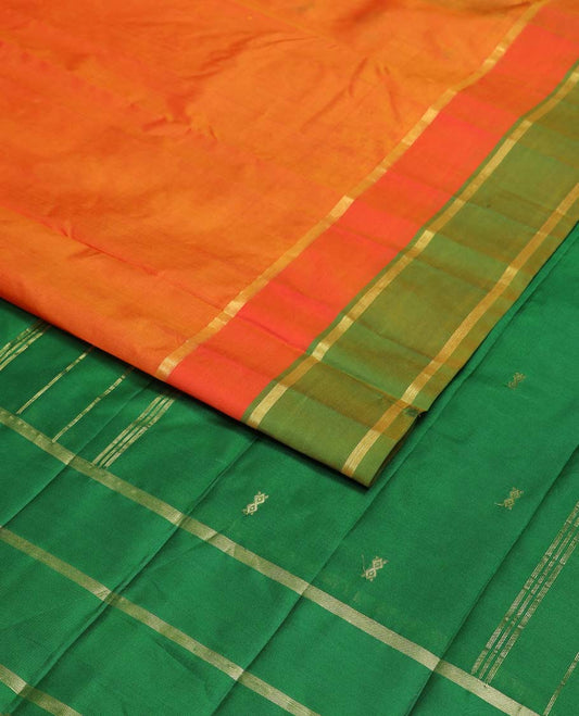 Orange buttas kancheepuram silk saree with contrast zari border & striped, floral motifs pallu
