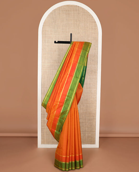 Orange buttas kancheepuram silk saree with contrast zari border & striped, floral motifs pallu