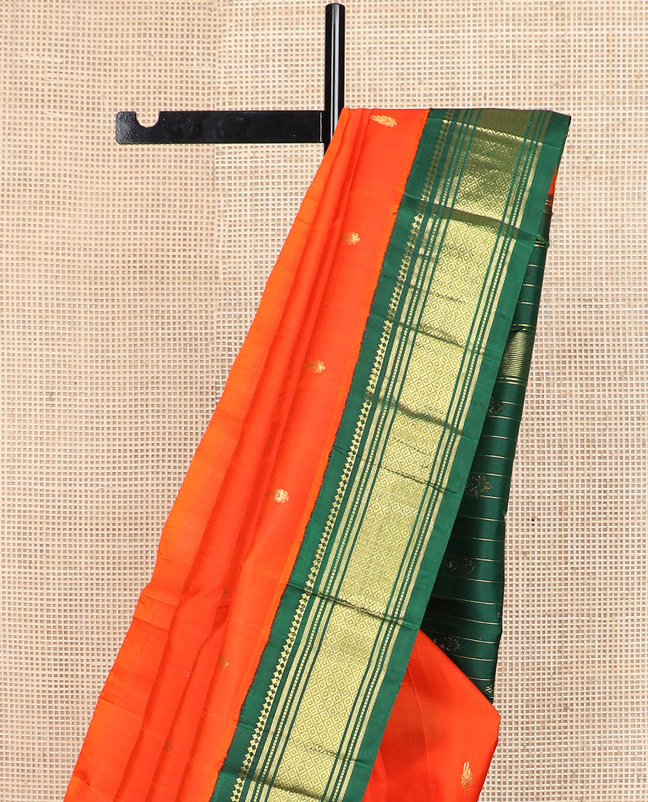 Orange zari buttas Kanchipuram silk saree, contrast one-sided korvai border of paneer sombu, banaras, muthu, and mayil kann, and zari design pallu