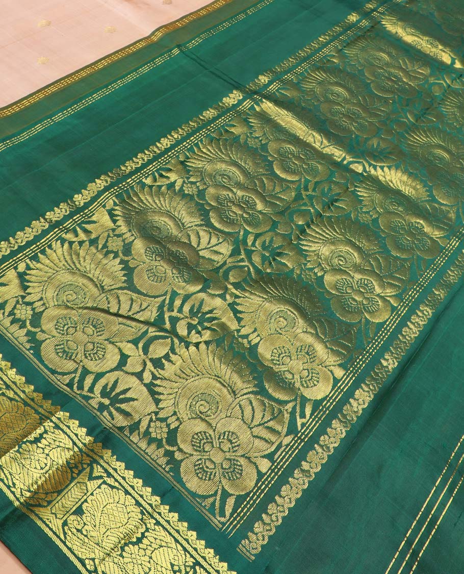 Sandal zari buttas Kanchipuram silk saree, contrast one-sided korvai border of thilakam mokku, and mayil designs, and floral design pallu