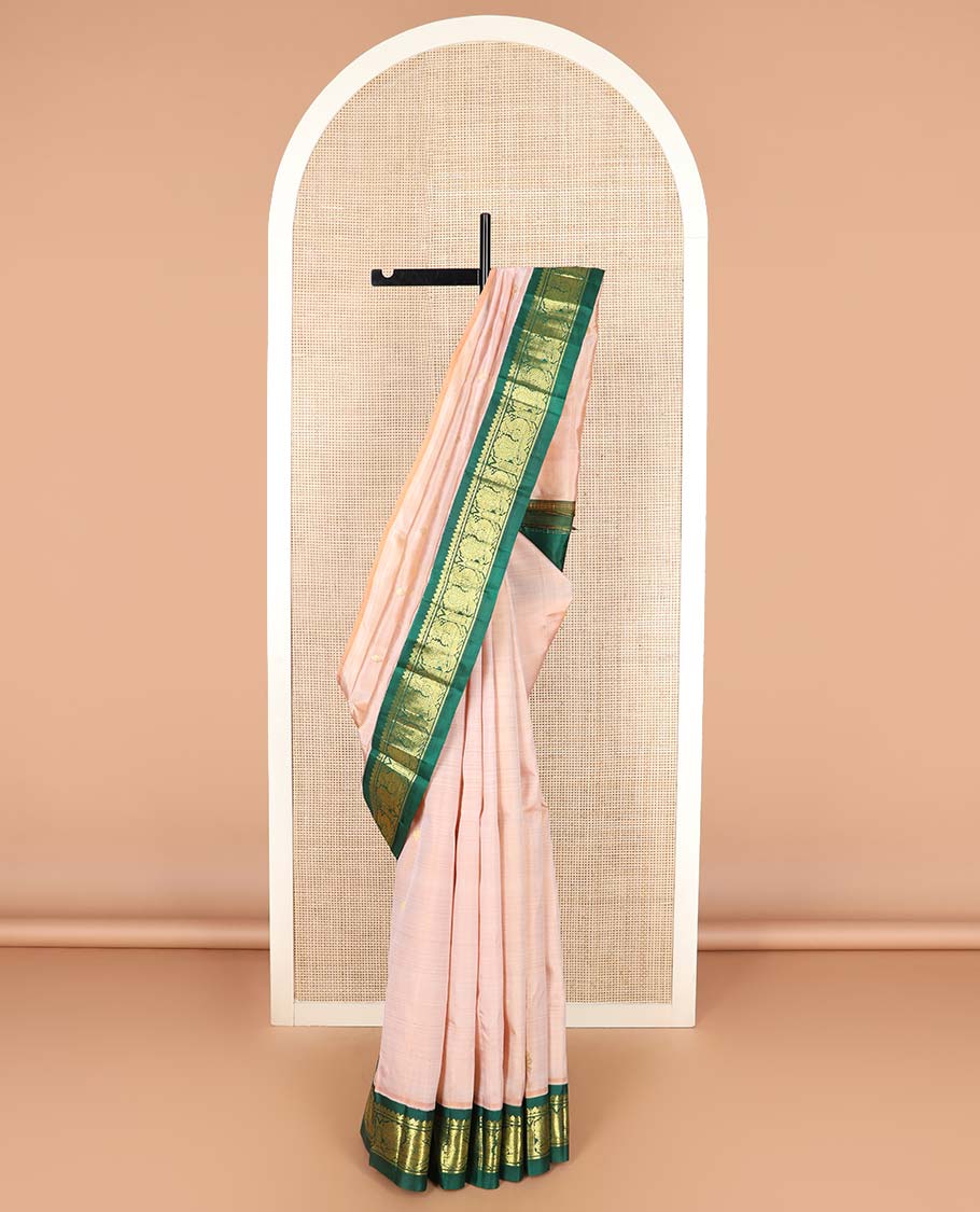 Sandal zari buttas Kanchipuram silk saree, contrast one-sided korvai border of thilakam mokku, and mayil designs, and floral design pallu