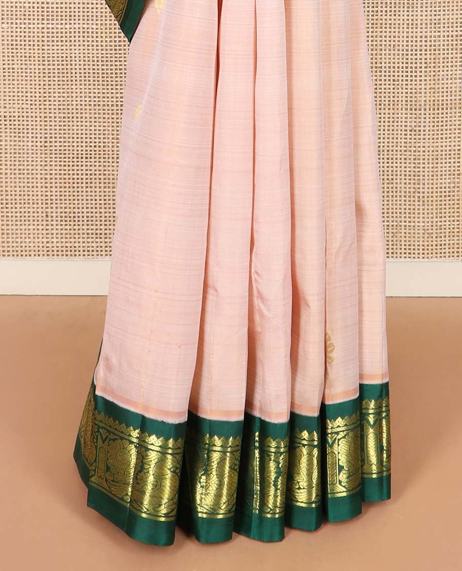 Sandal zari buttas Kanchipuram silk saree, contrast one-sided korvai border of thilakam mokku, and mayil designs, and floral design pallu