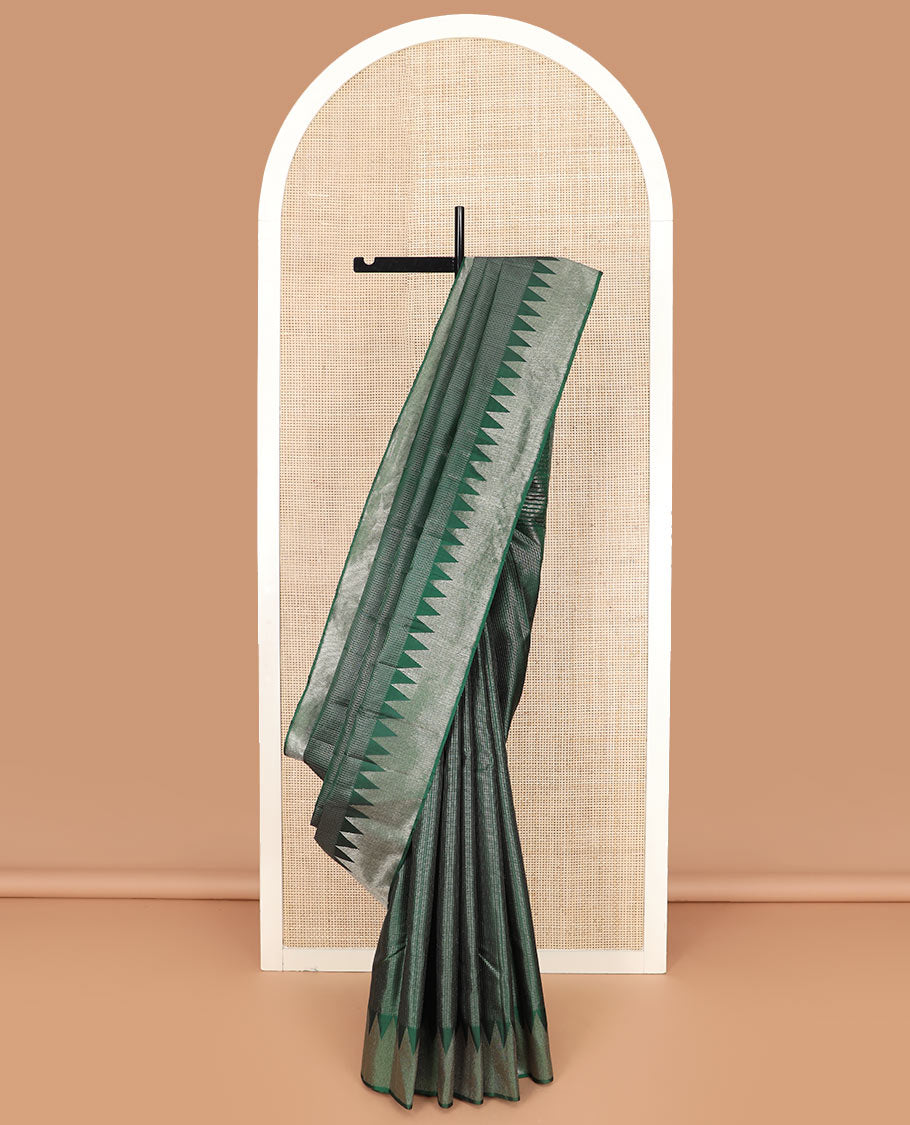 Green micro-checked Kanchipuram silk saree, thazampoo rekku zari border, and pallu of seppu rekku designs