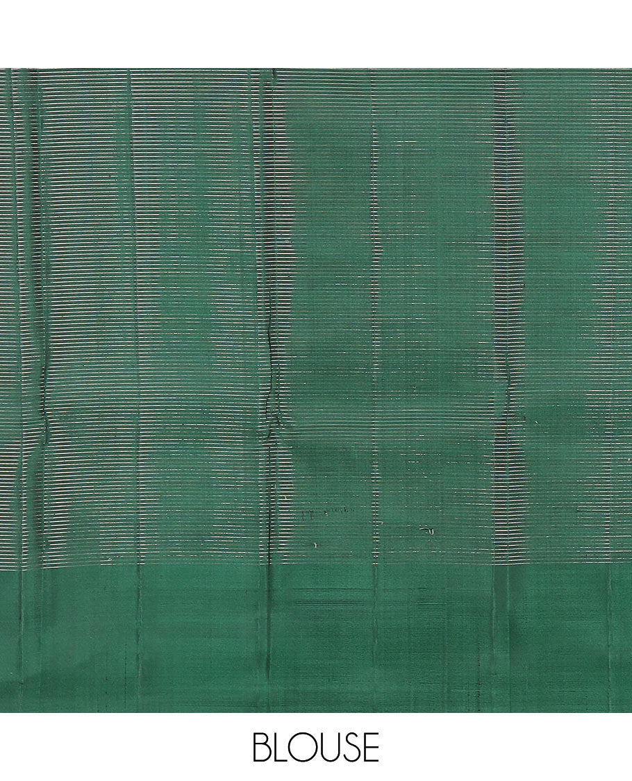 Green micro-checked Kanchipuram silk saree, thazampoo rekku zari border, and pallu of seppu rekku designs
