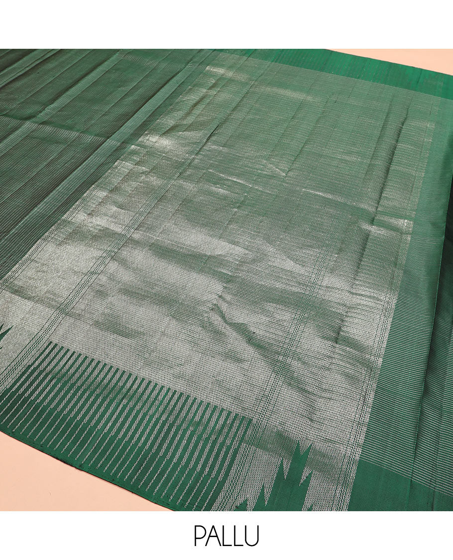 Green micro-checked Kanchipuram silk saree, thazampoo rekku zari border, and pallu of seppu rekku designs
