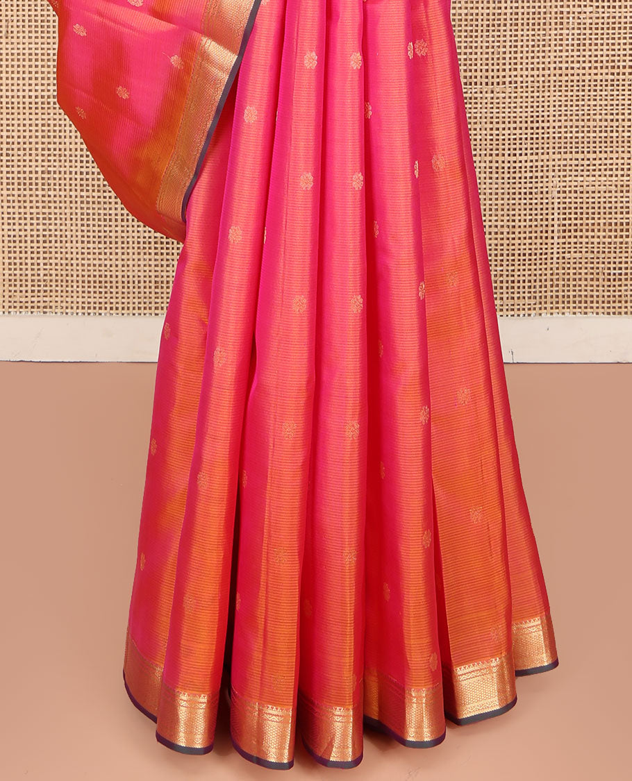 Pink Kanchipuram Silk Saree, Subtly Sparkled with Zari Buttas and Vazhaipoo Stripes All Over Its Body, Highlighted by a Zari Border of Rekku, Banaras, Neli, and Mayil Kann Designs, Intricately Designed Pallu, and Paired with a Matching Blouse