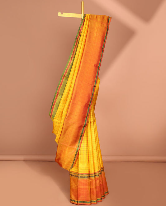 Yellow checked kancheepuram silk saree with contrast rettai pettu border & striped design pallu