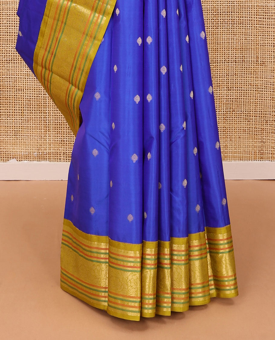 Blue zari buttas silk saree, contrast border of muthu,mayil kann,poun,kathir & floral design & neli striped pallu
