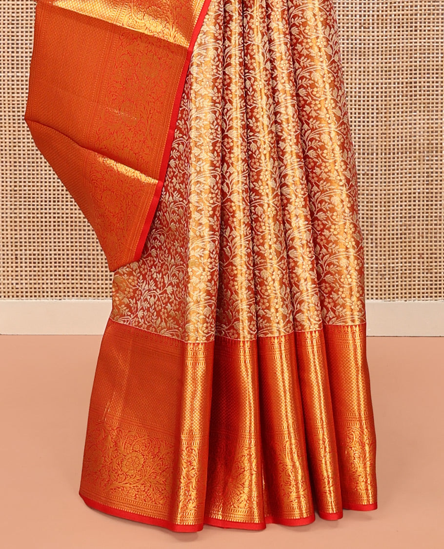 Red Kanchipuram Tissue Silk Saree, Richly Detailed with Floral Jaal Jacquard Design On Its Body, Highlighted by Zari Border of Thilakam Mokku, Muthu, Mayil Kann, and Kodi Visiry Designs, Grand Jaal Pallu, and Paired with a Matching Blouse