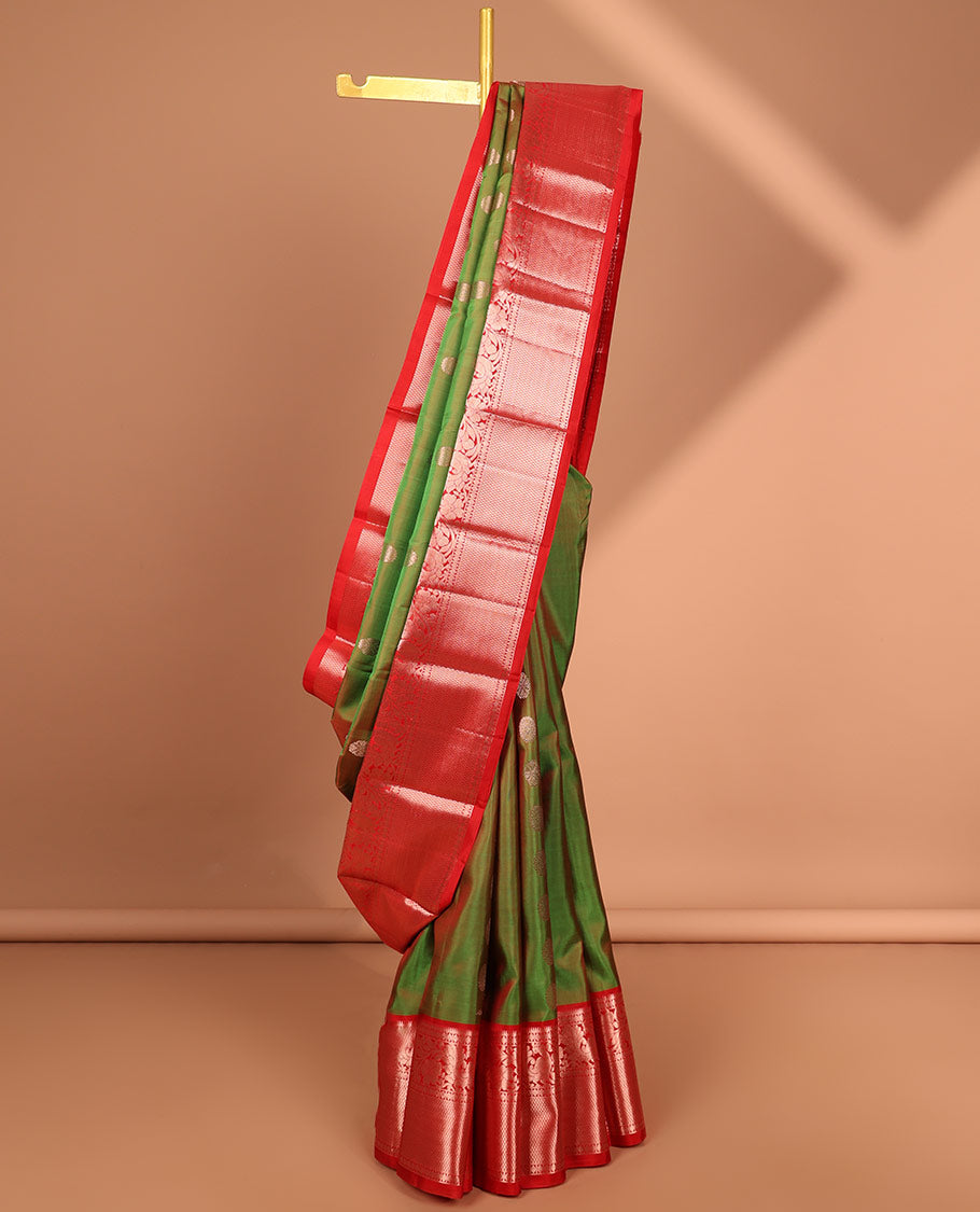 Green floral buttas kancheepuram silk saree with contrast border of kodi visiry, mayil kann design & zari design pallu