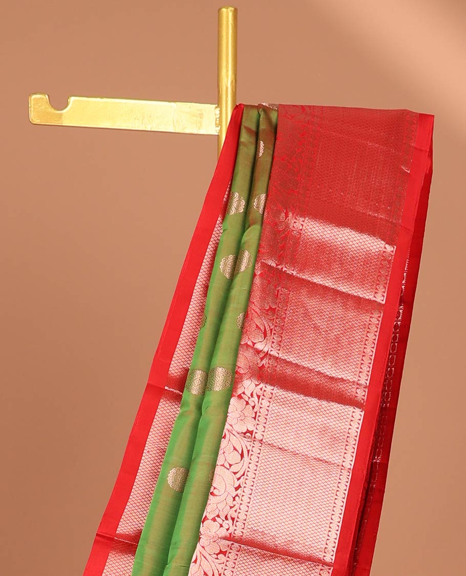 Green floral buttas kancheepuram silk saree with contrast border of kodi visiry, mayil kann design & zari design pallu