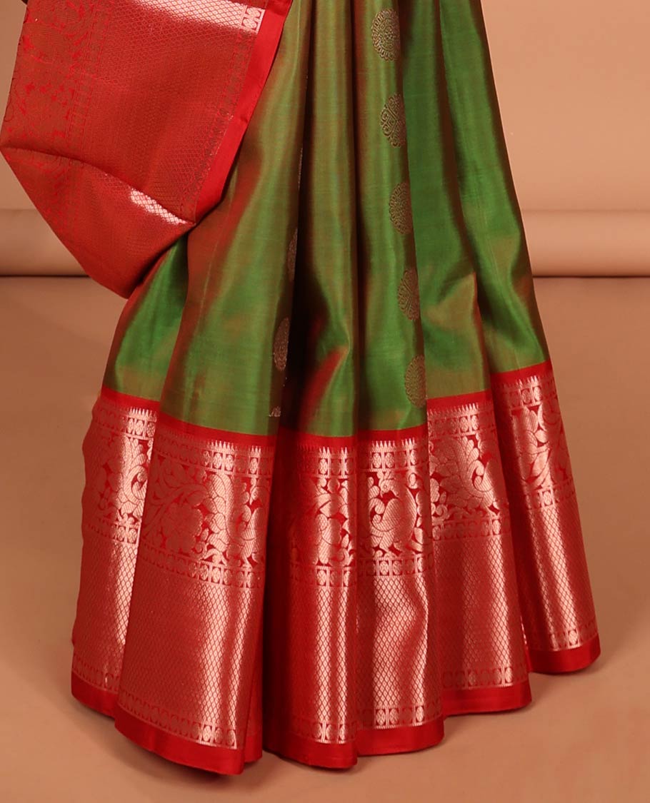 Green floral buttas kancheepuram silk saree with contrast border of kodi visiry, mayil kann design & zari design pallu