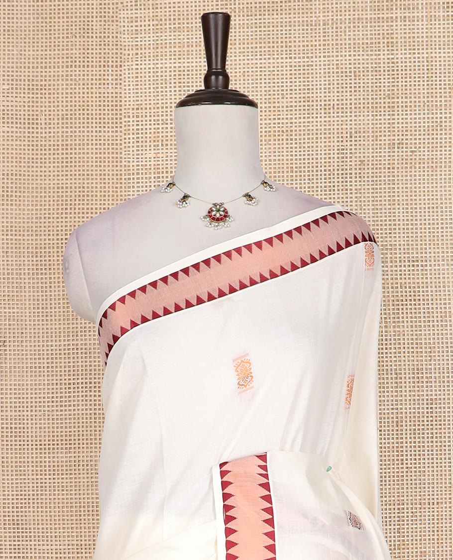 Cream copper zari buttas Kerala cotton saree, zari temple border, and pallu of intricate zari designs